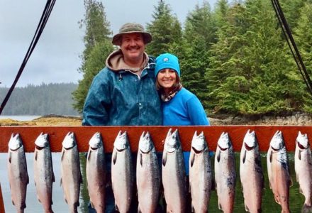 Happy couple with their salmon catch