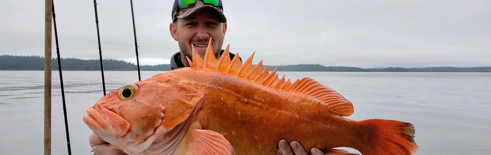 Guests holds a large yelloweye rockfish.
