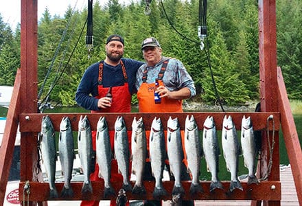Guests pose with their silver salmon catch.