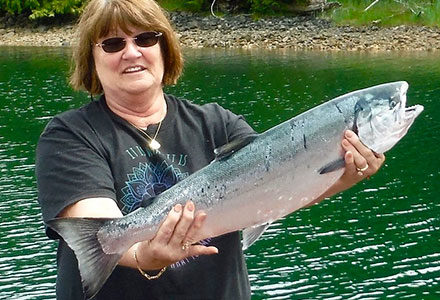 Femalse guests shows off her silver salmon.