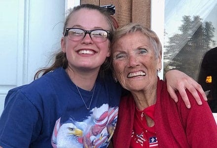 Guest smiles for the camera with her granddaughter.