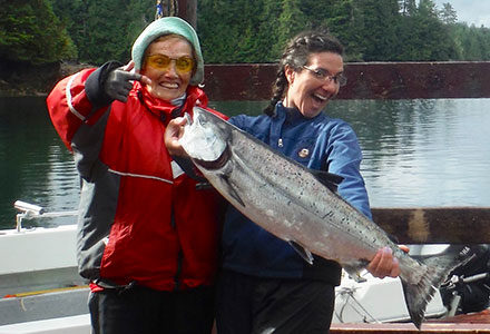 Two women guests show their king salmon catch.